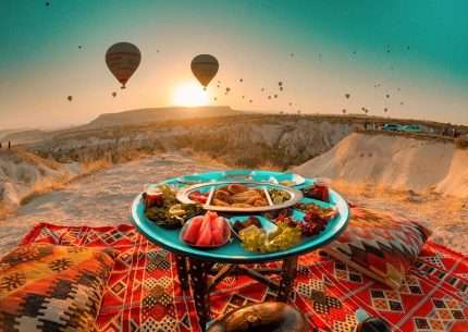 Hot air balloons over Cappadocia at sunrise